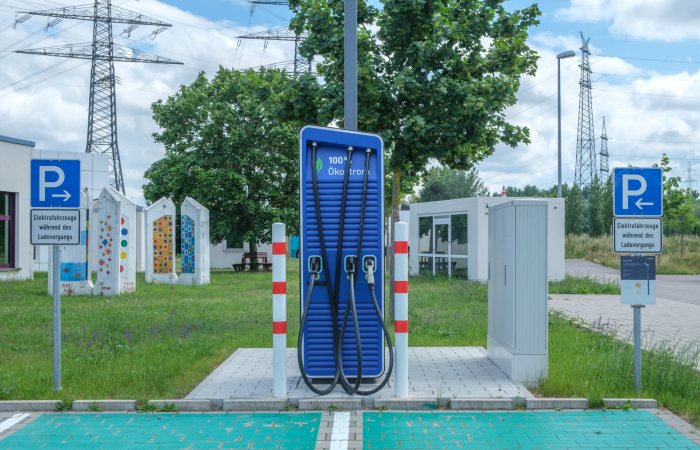 Public charging station with eco-friendly design for electric vehicles.